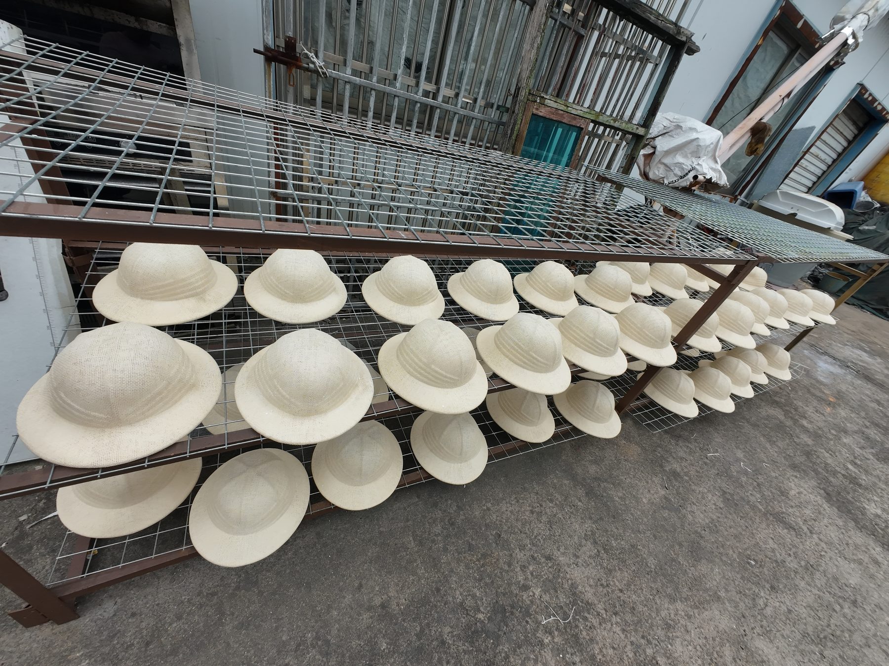 Finished hats ready for quality checking and shipment photo 1