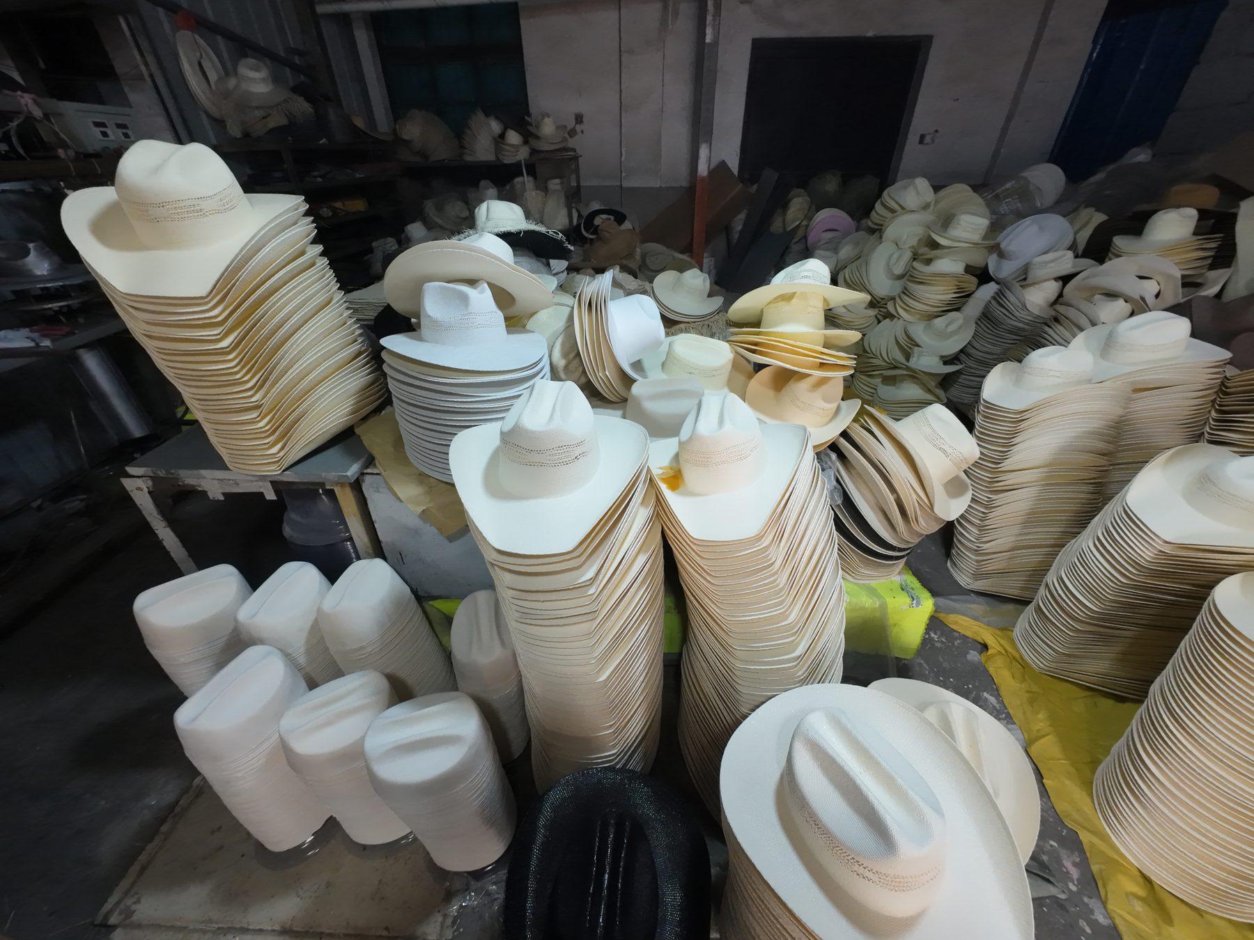 Finished hats ready for quality checking and shipment photo 4