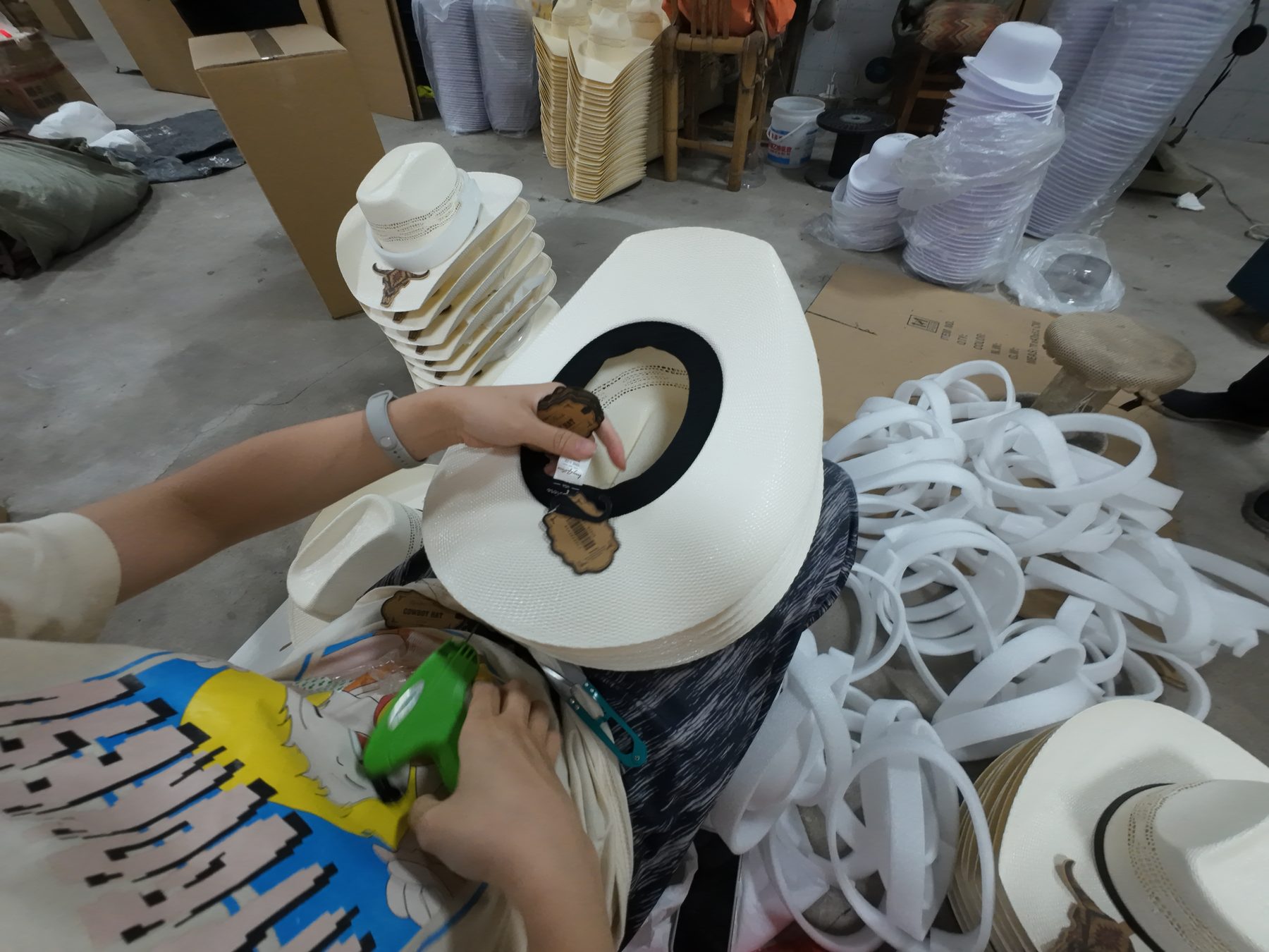 Finished hats ready for quality checking and shipment photo 9