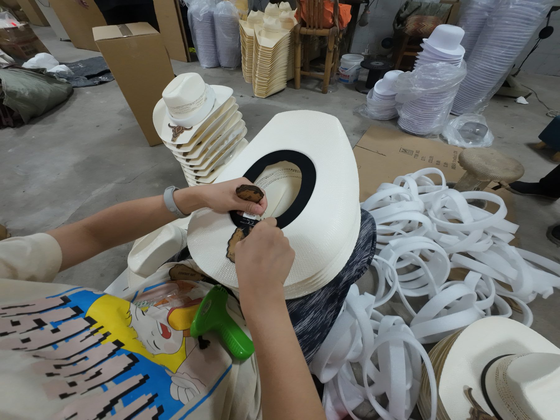 Finished hats ready for quality checking and shipment photo 10