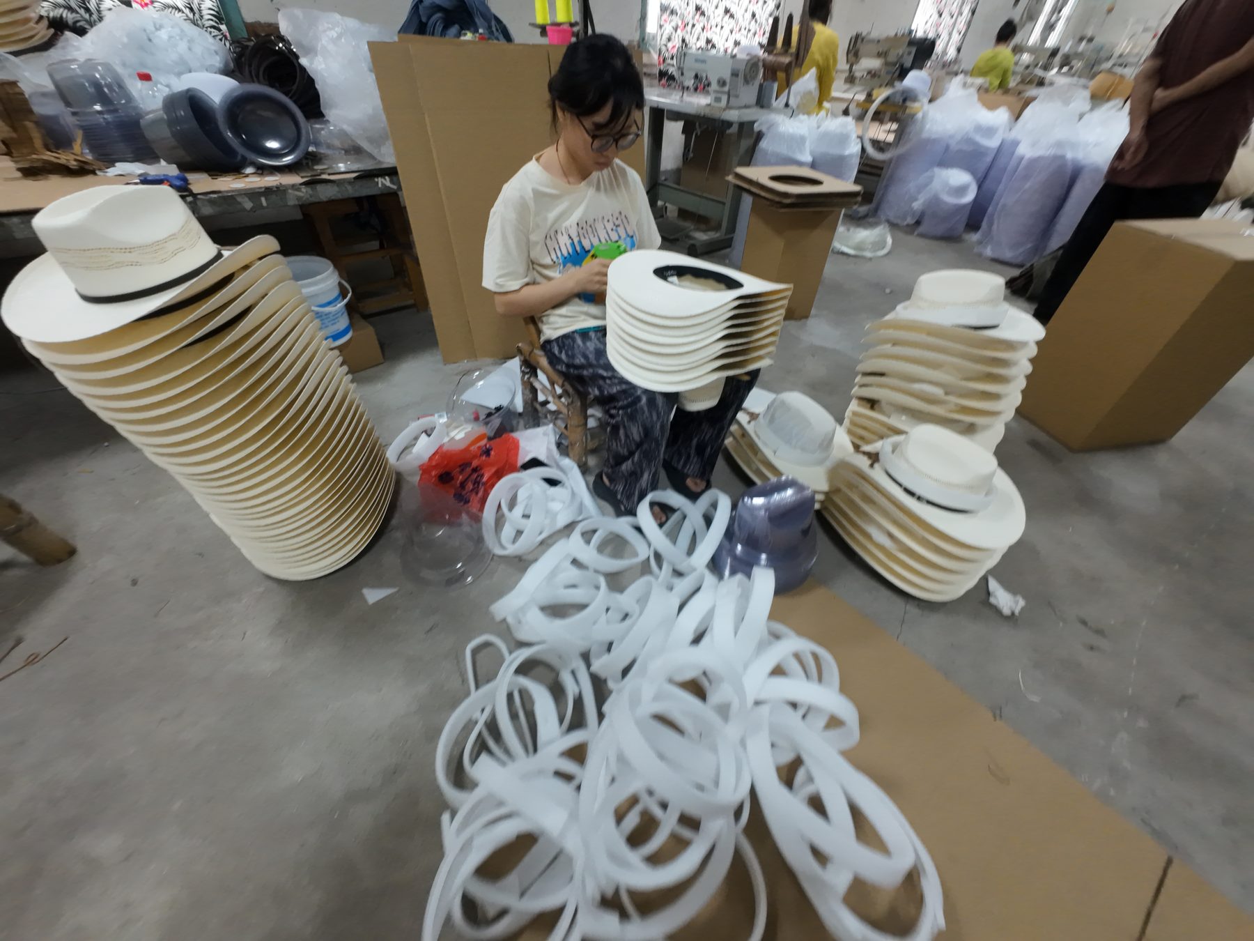 Finished hats ready for quality checking and shipment photo 12