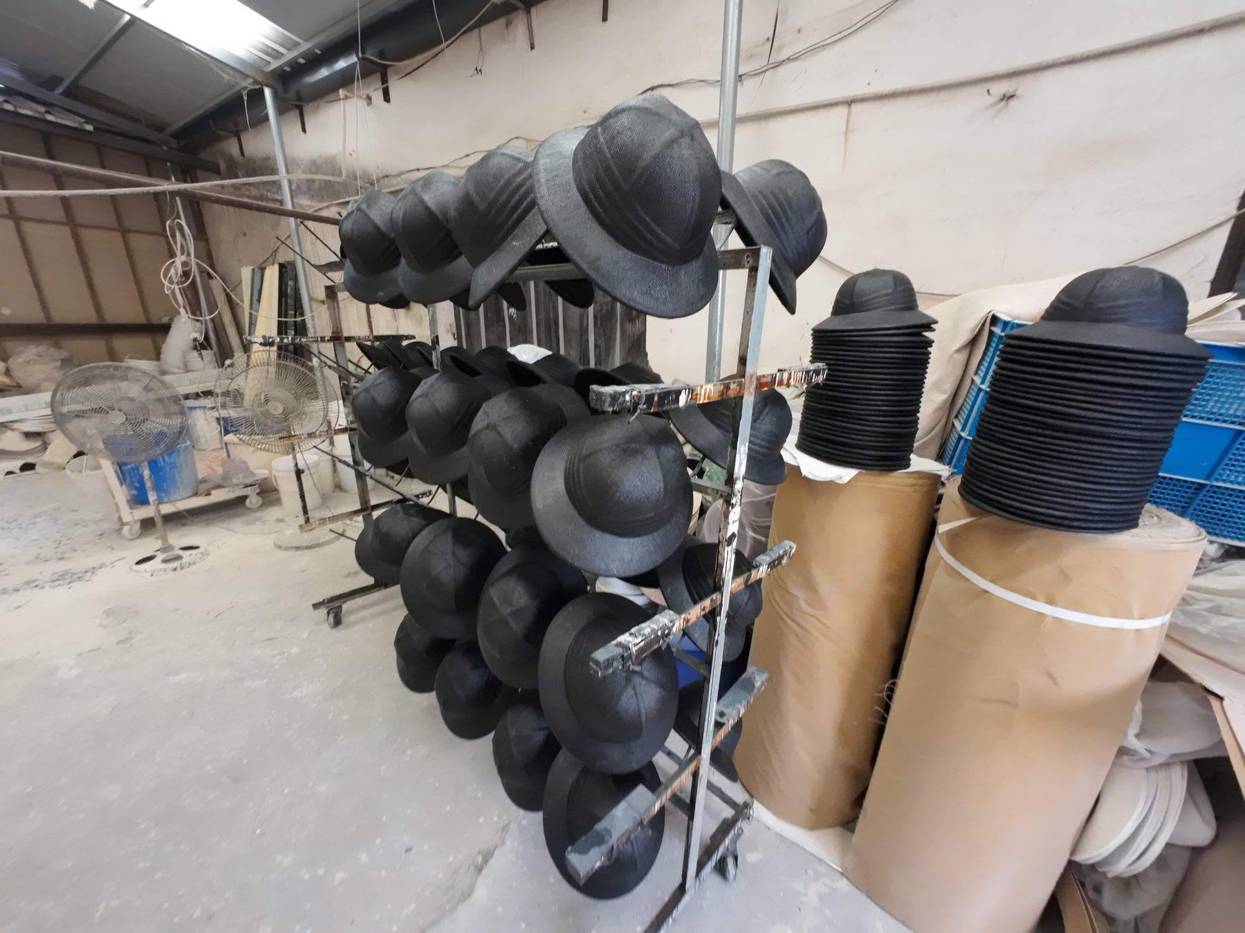 Finished hats ready for quality checking and shipment photo 15
